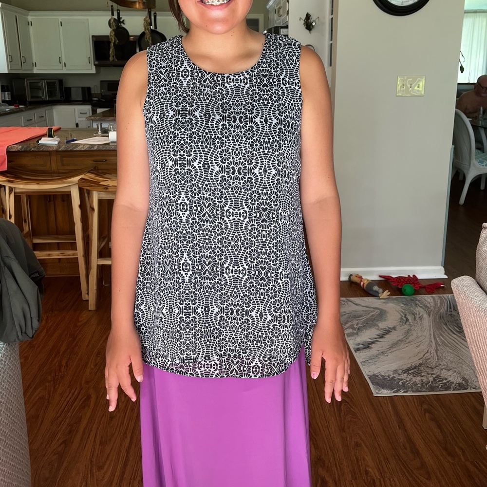 Finger tip two layer dress top. Size Small. Black and white print with layers